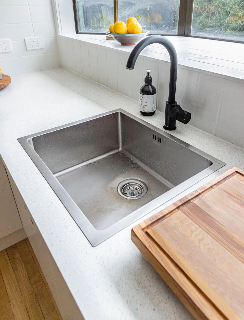 sstainless steel kitchen sink white countertops