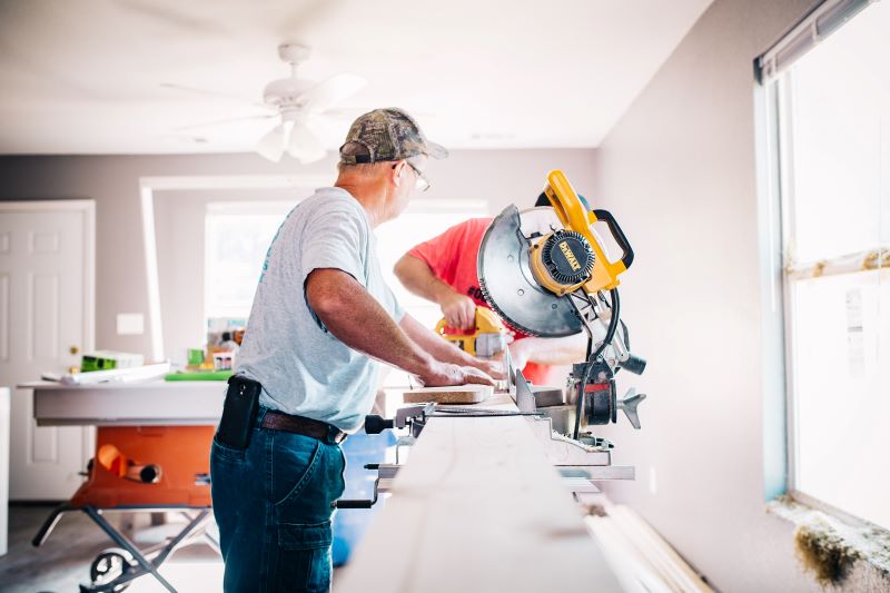 home improvements two men working with machine