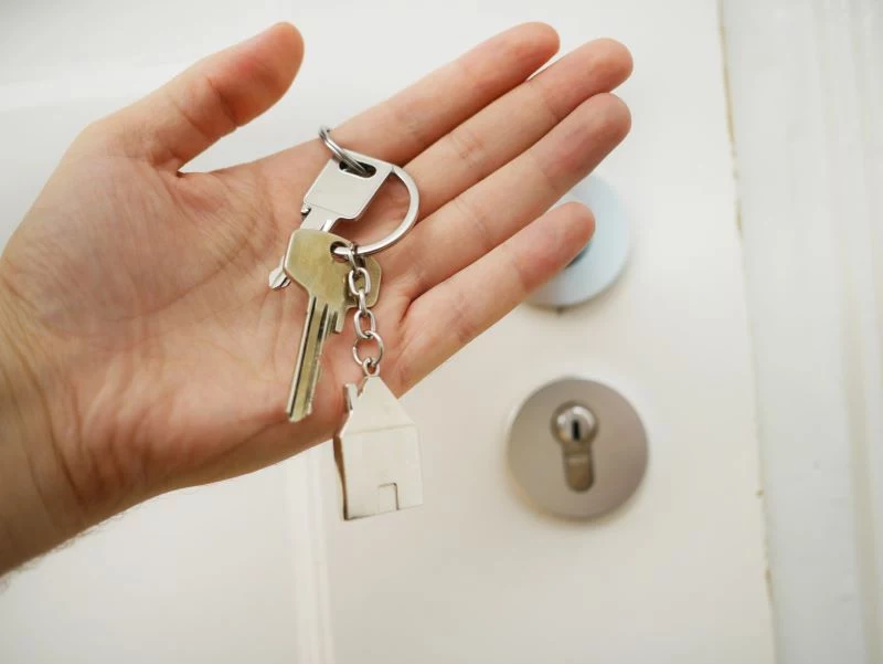 house keys in hand buying a home