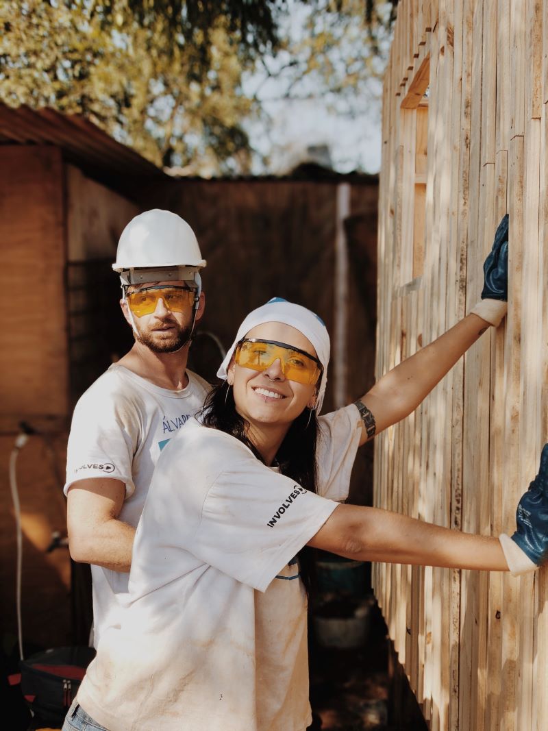 man woman with protective gear home improvements