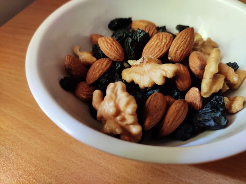 mixed nuts in white bowl