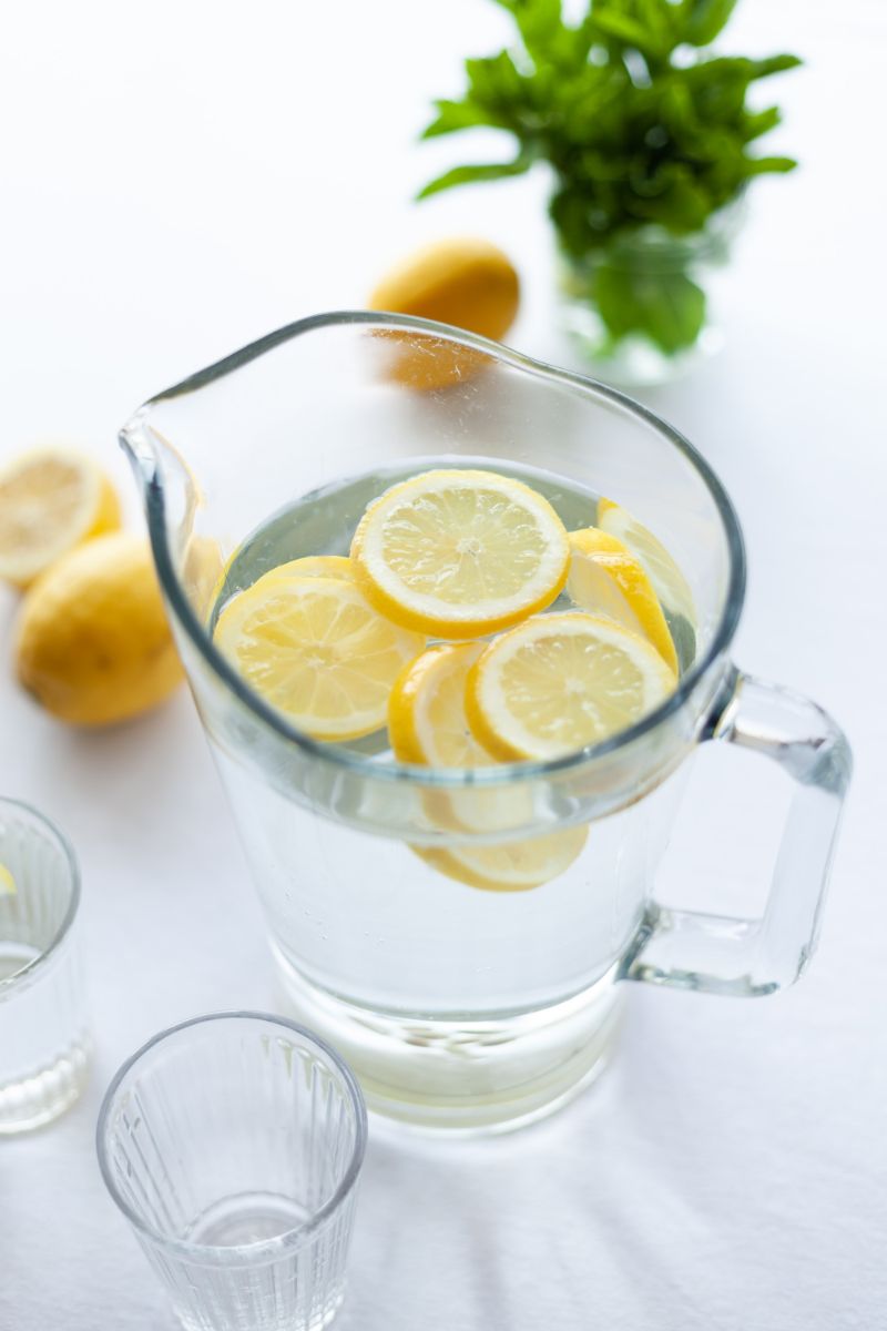pitcher full of water is lemon water good for you lemon slices