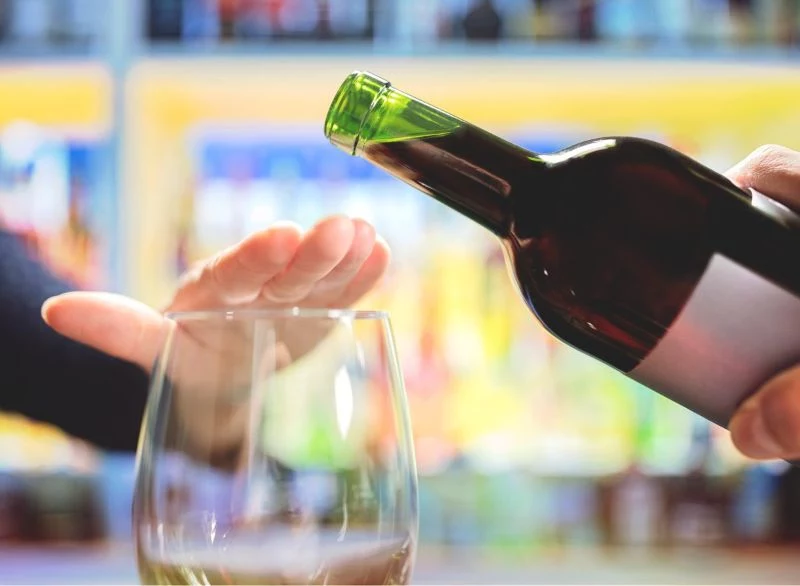 woman refusing alcohol how to cleanse your liver wine