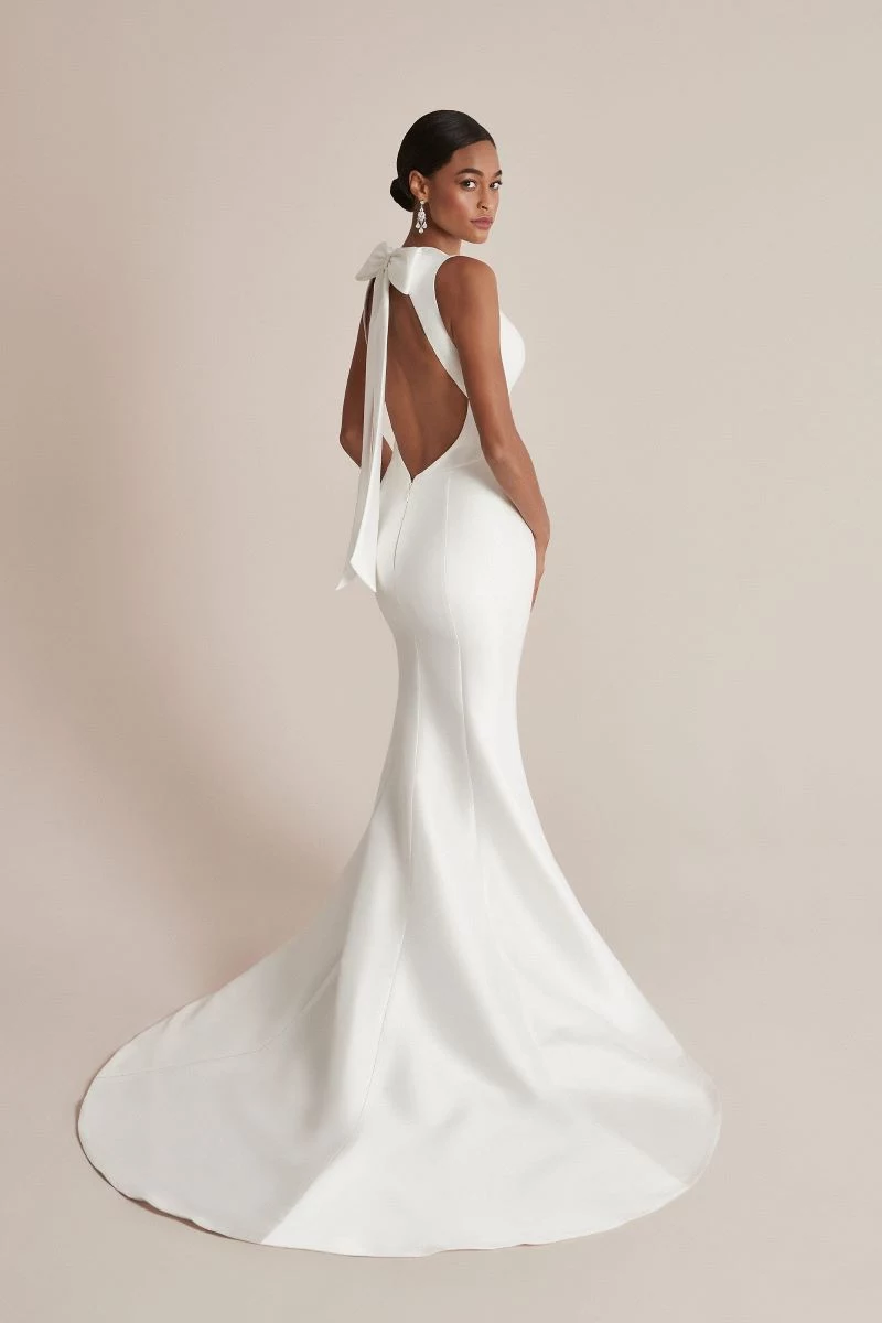 bare back wedding dress trends with bow