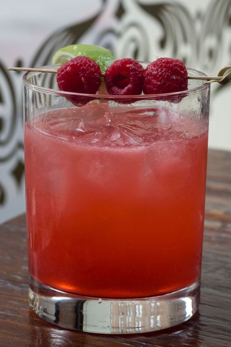 caipirinhia recipe rum cocktails raspberry garnish