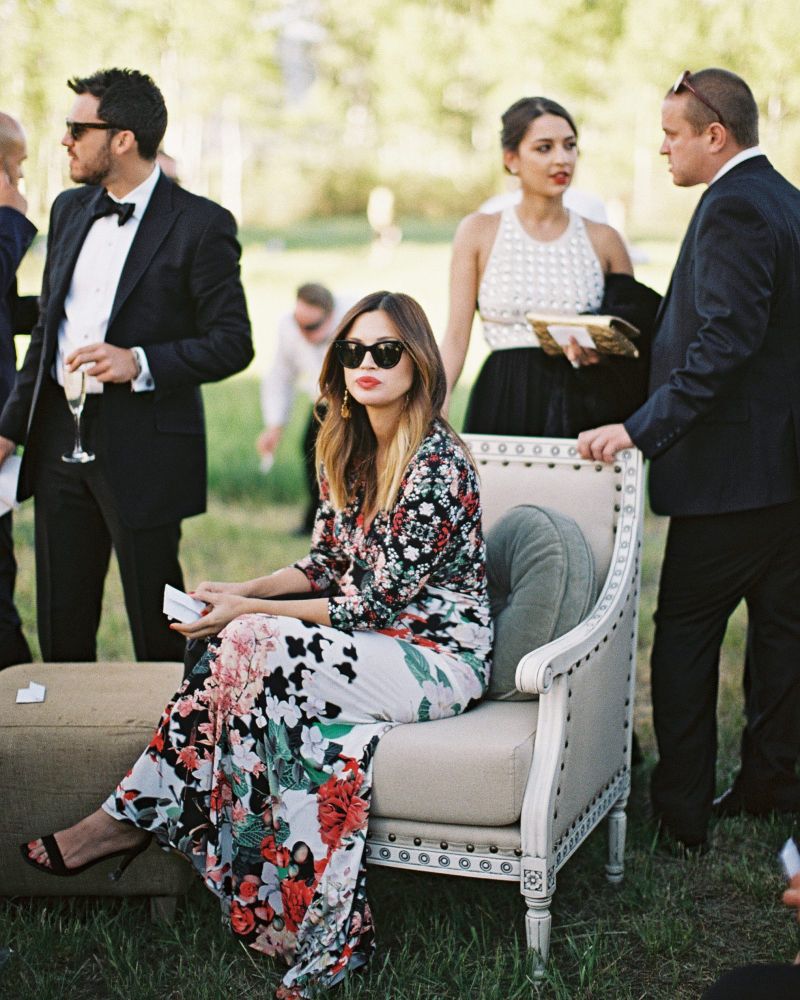 cocktail dresses for weddings woman sitting on armchair