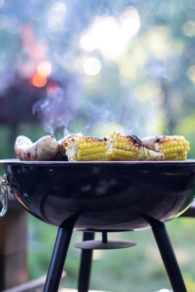 corn on the cob bbq tips placed on grill