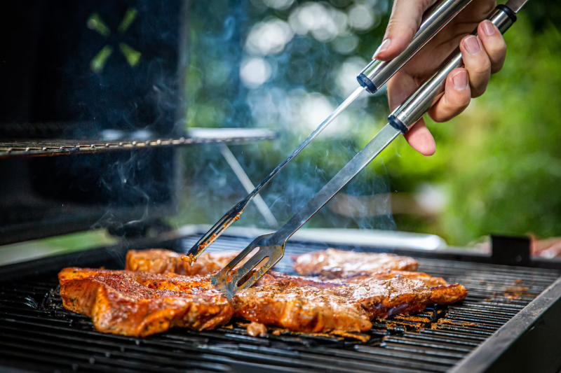 grilling meat bbq tips with tongs