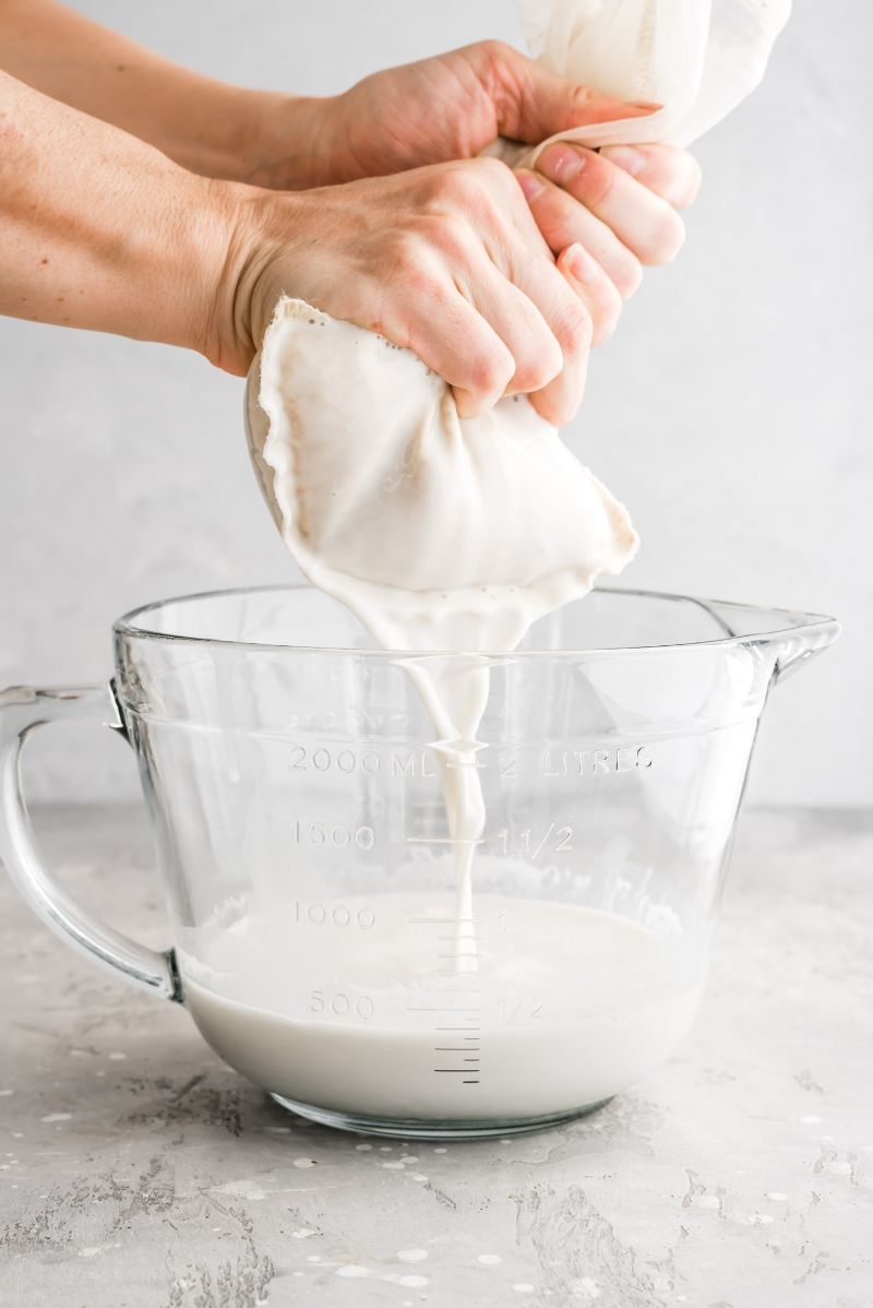 milk strained in jar homemade oat milk