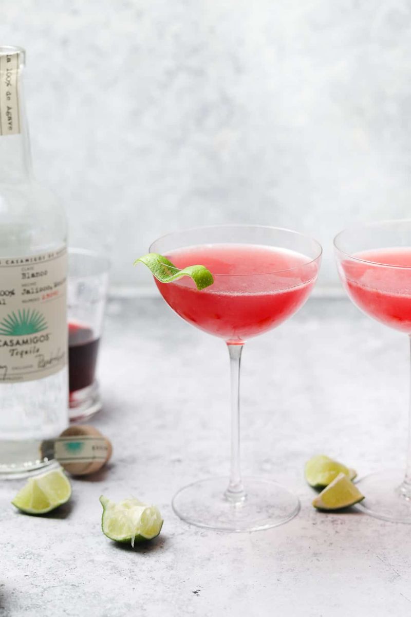 pomegranate tequila drink recipes in two tall glasses