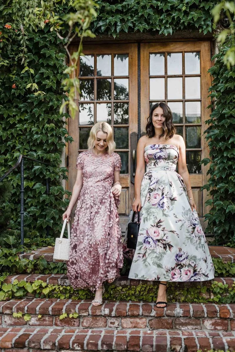 two women with floral dresses wedding guest dresses