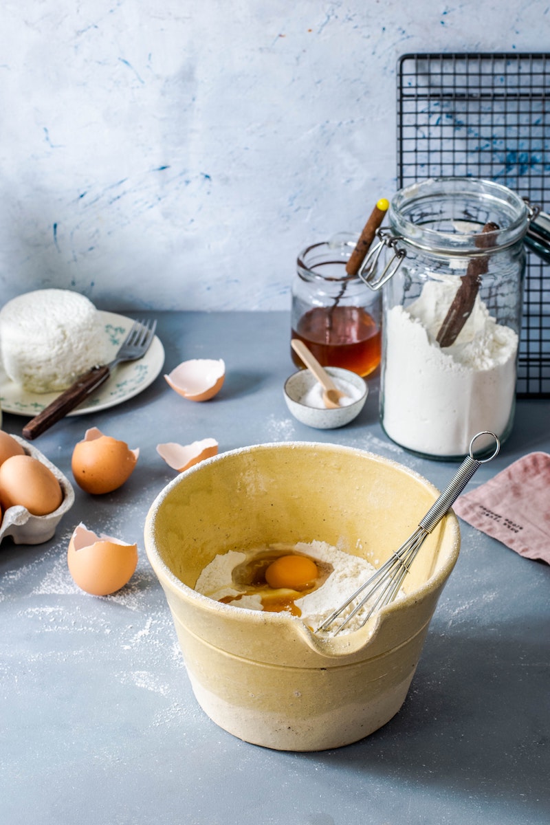 4.coooking with baking soda used for baking of sweets in a yellow bowl