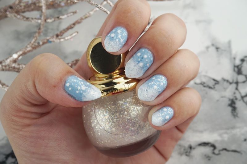blue nail ideas 2021 with snowflake decorations