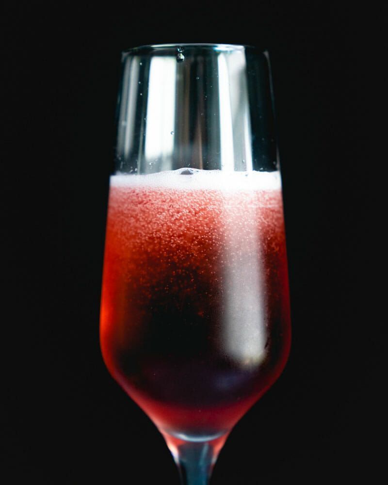 chambord and champagne cocktail recipe in flute