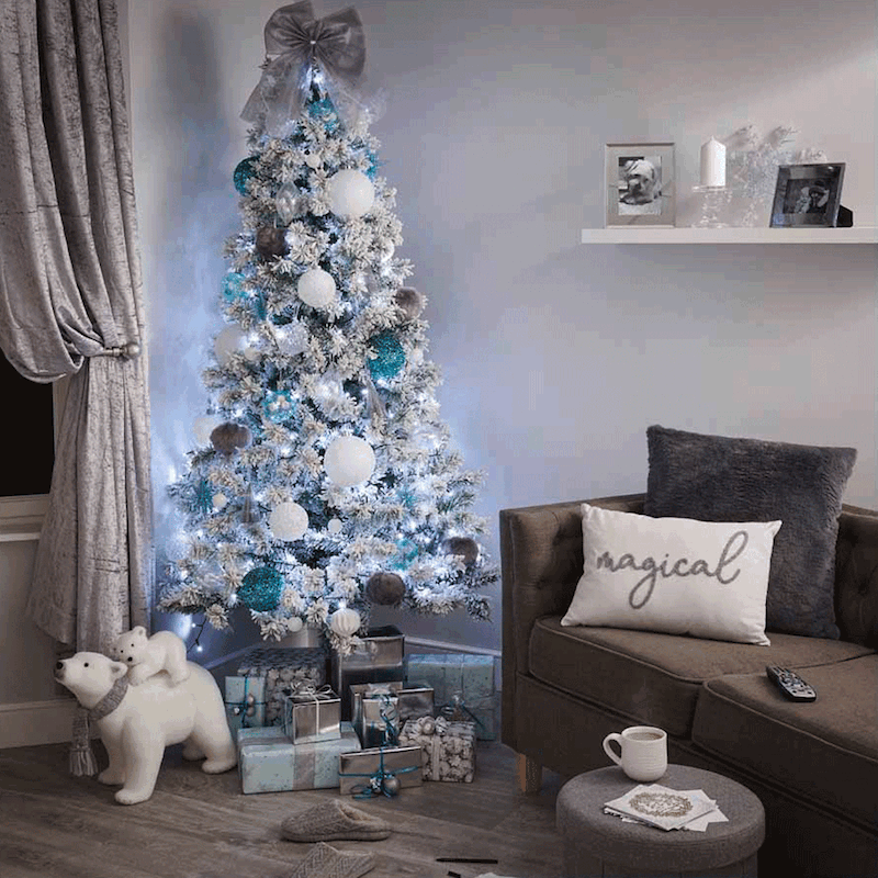 christmas tree topper trend winter wonderland decoration theme in blue and white