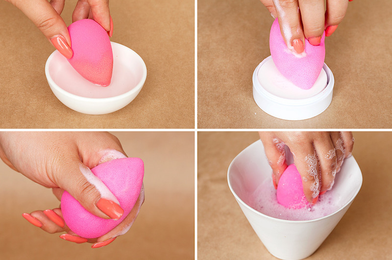 cleaning pink sponge with soap and warm water