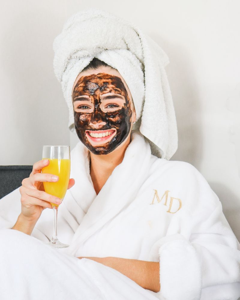 face mask applied on woman skin care regimen