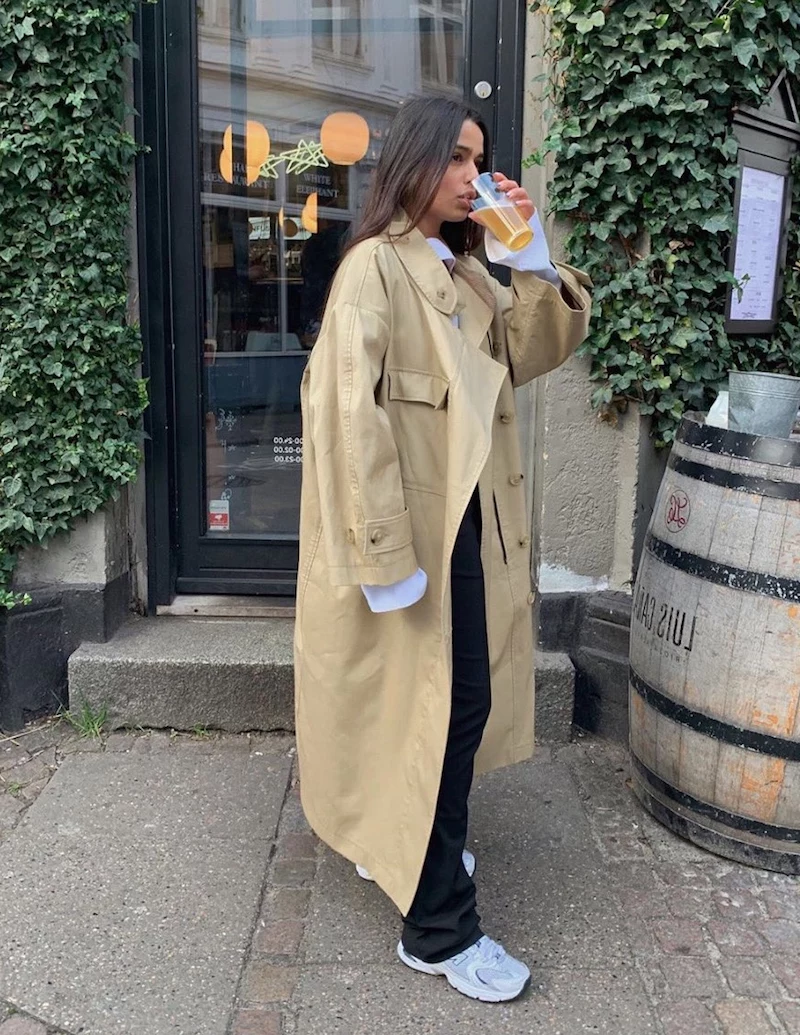 girl with beige trench coat and sneakers