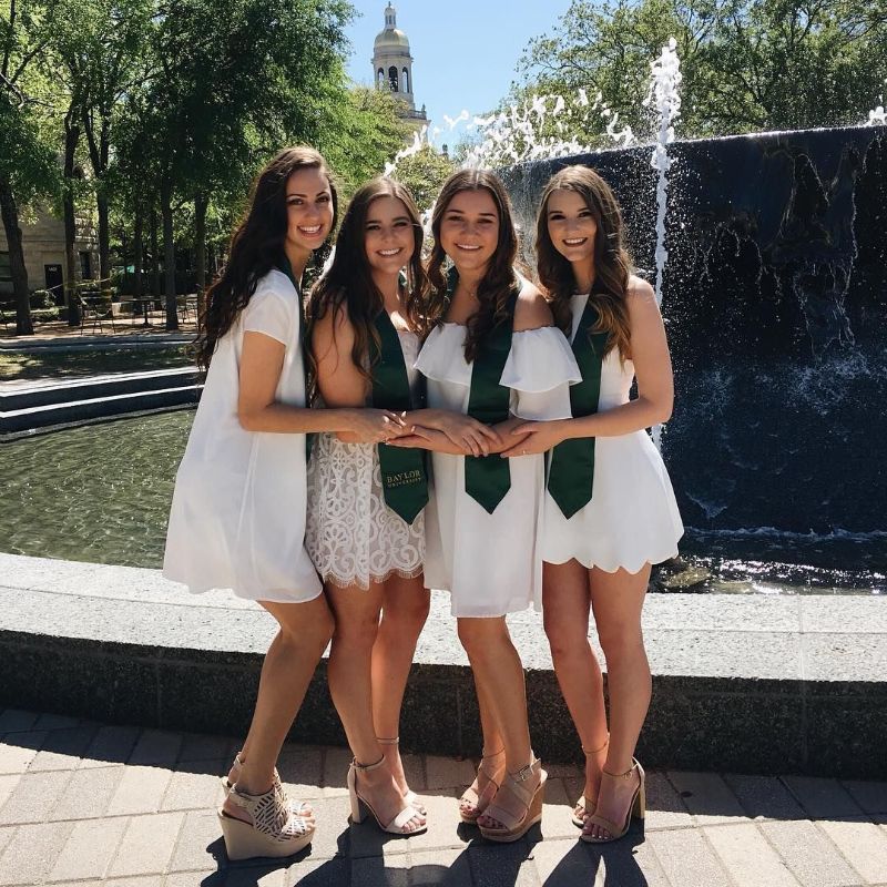 graduation outfits four girls wearing white dresses