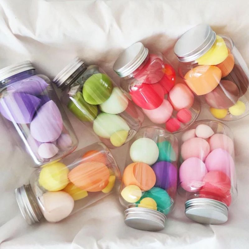 jars filled with colorful makeup eggs