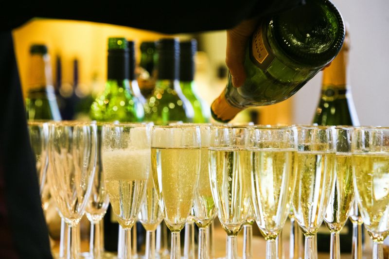 lots of champagne flutes sparkling wine cocktails