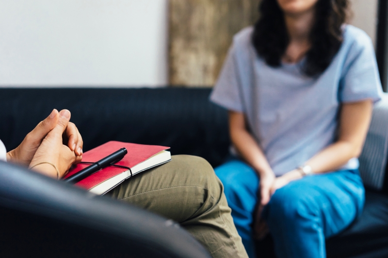 mental health woman talking to therapist