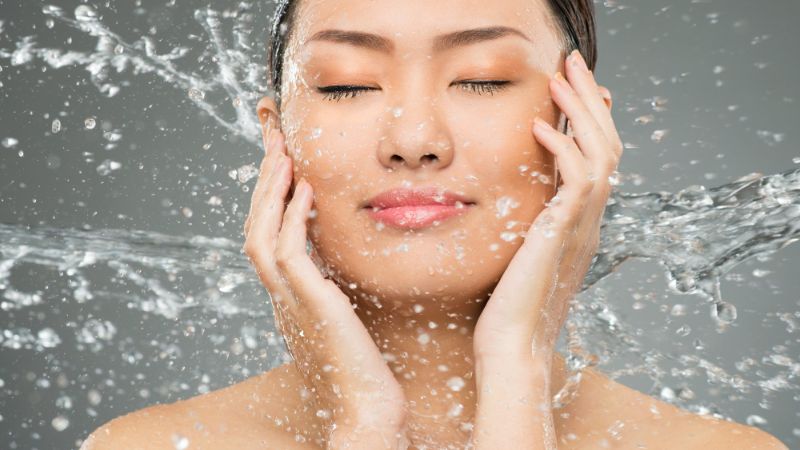 skin care routine steps water around woman