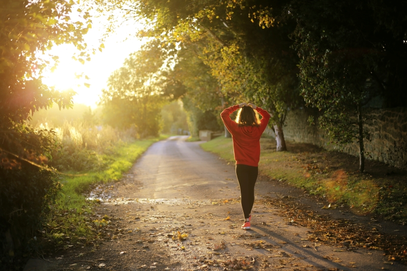 woman walking down the road mental health