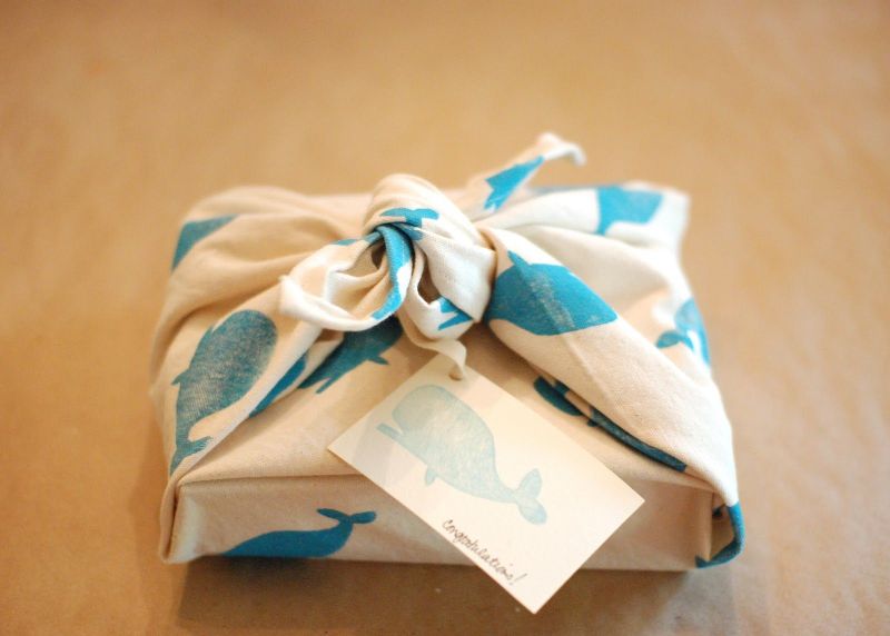 baby shower gift box wrapped in cloth