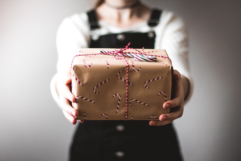 creative packaging for christmas gifts with candy cane wrapping paper