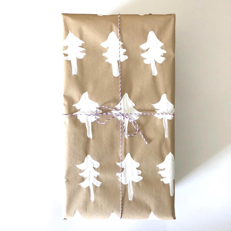 diy packaging ideas for christmas gifts with handrawn elements and yarn ribbon