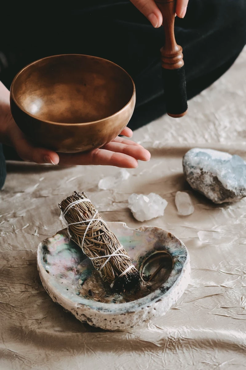 how to recharge crystals at home using a singing bowl and sage