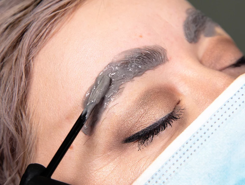 brow lamination and tint beauty procedure in the process