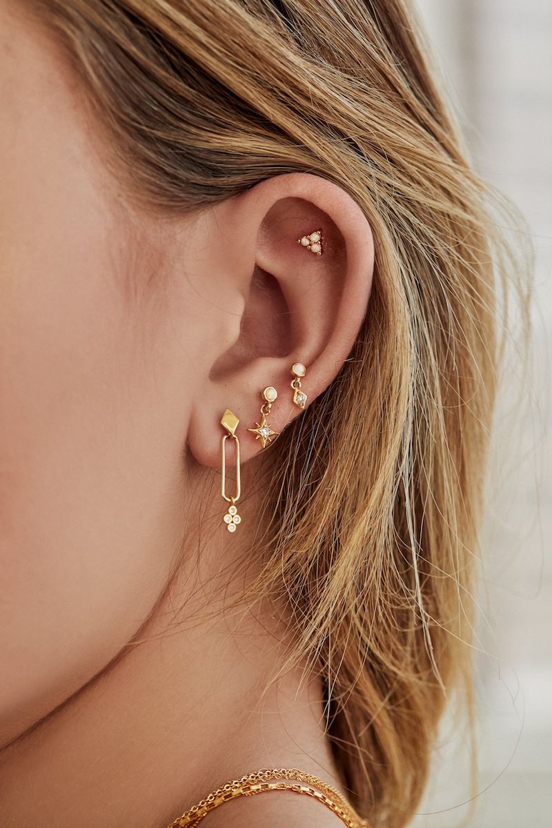 conch ear piercing ear with ear piercings