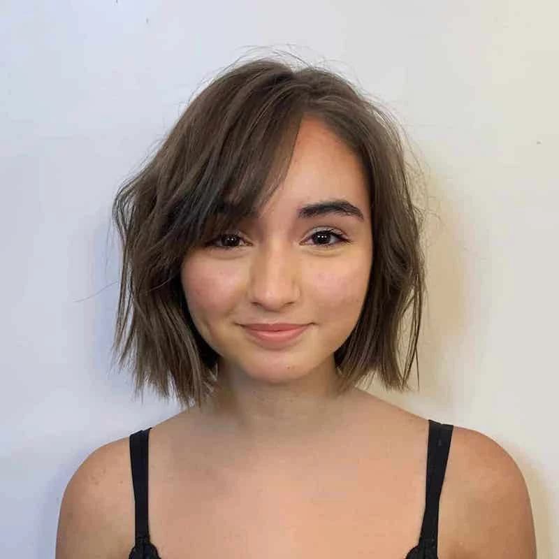 cute haircuts for women short choppy hairstyle with side bangs for fine hair