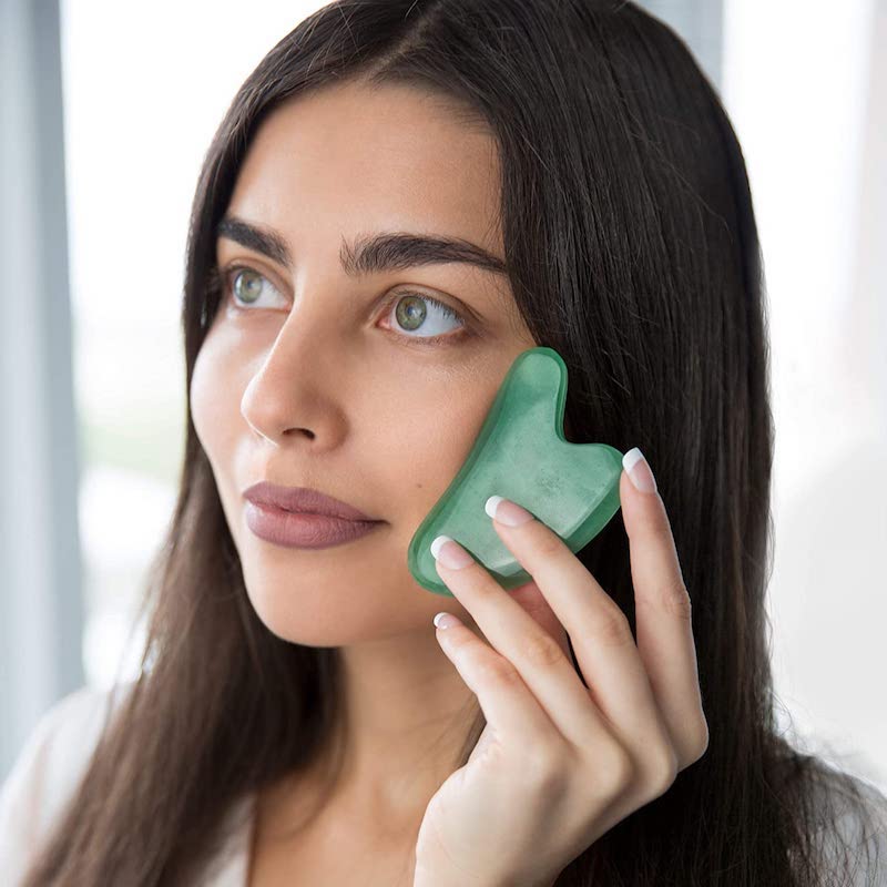 how to clean gua sha and use tool for relaxing massage for face