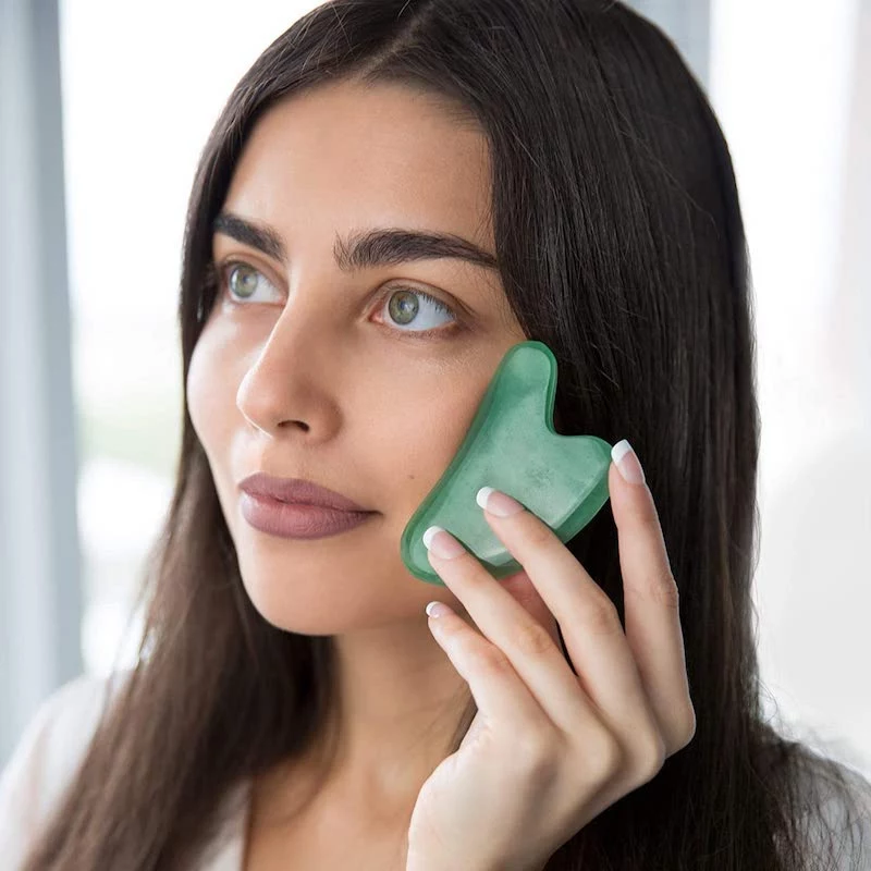 how to clean gua sha and use tool for relaxing massage for face
