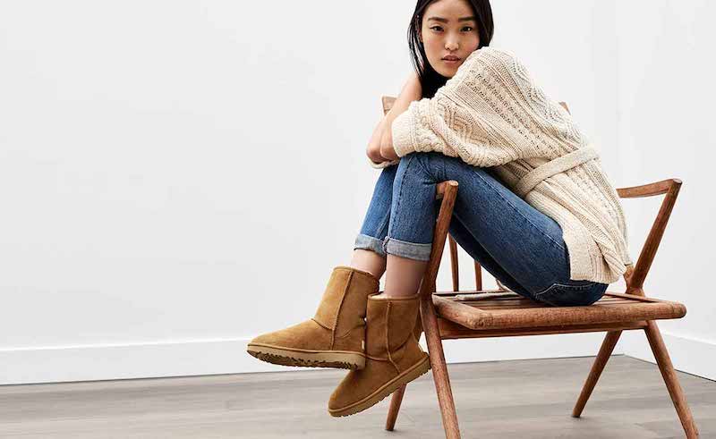 how to get stain out of uggs woman sitting on a chair wearing uggs