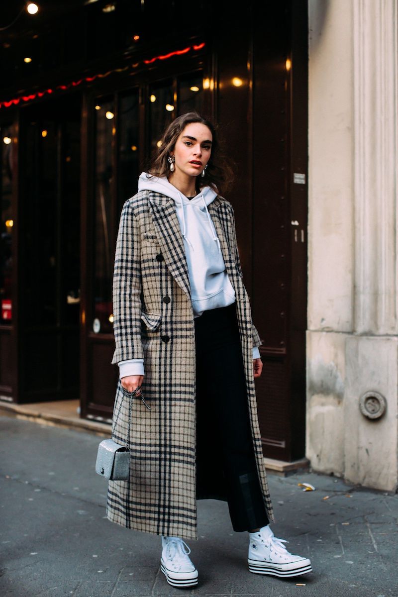 tourist attire white converse with long jacket