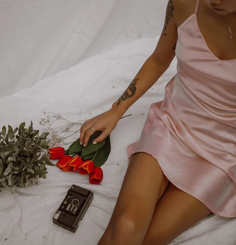 valentines day nails coffin shape woman sitting on a bed