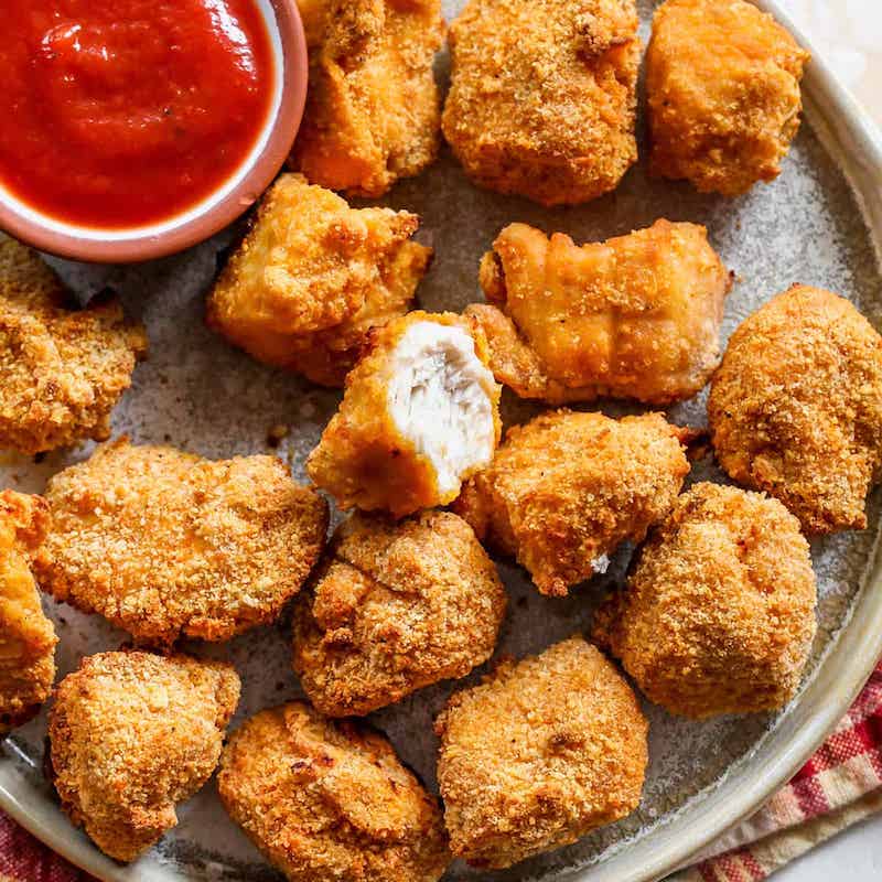 chicken strips chicken nuggets and ketchup