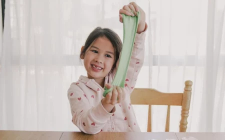 how to clean slime child playing with green slime