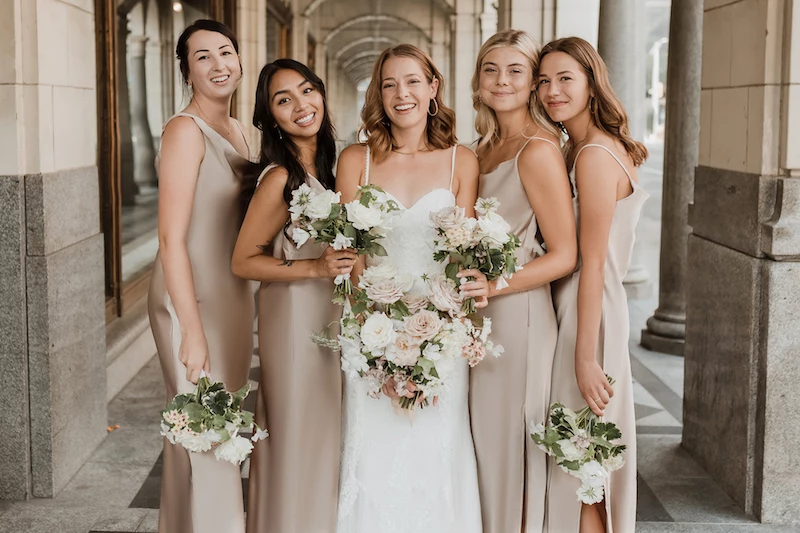 bride with her bridesmaids