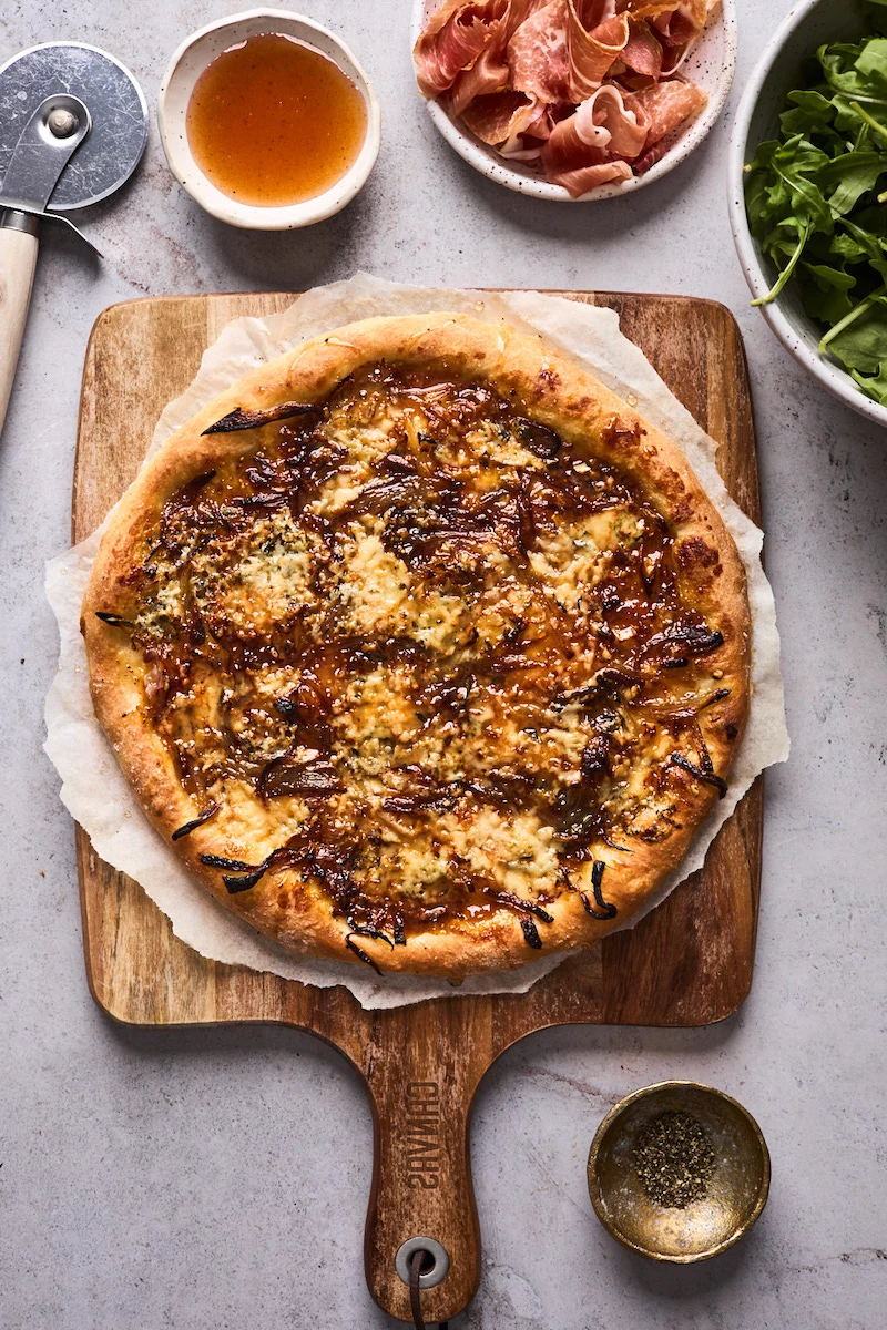 fig prosciutto gorgonzola and arugula pizza with hot honey recipe