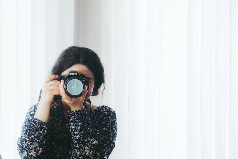 free background images woman taking photograph