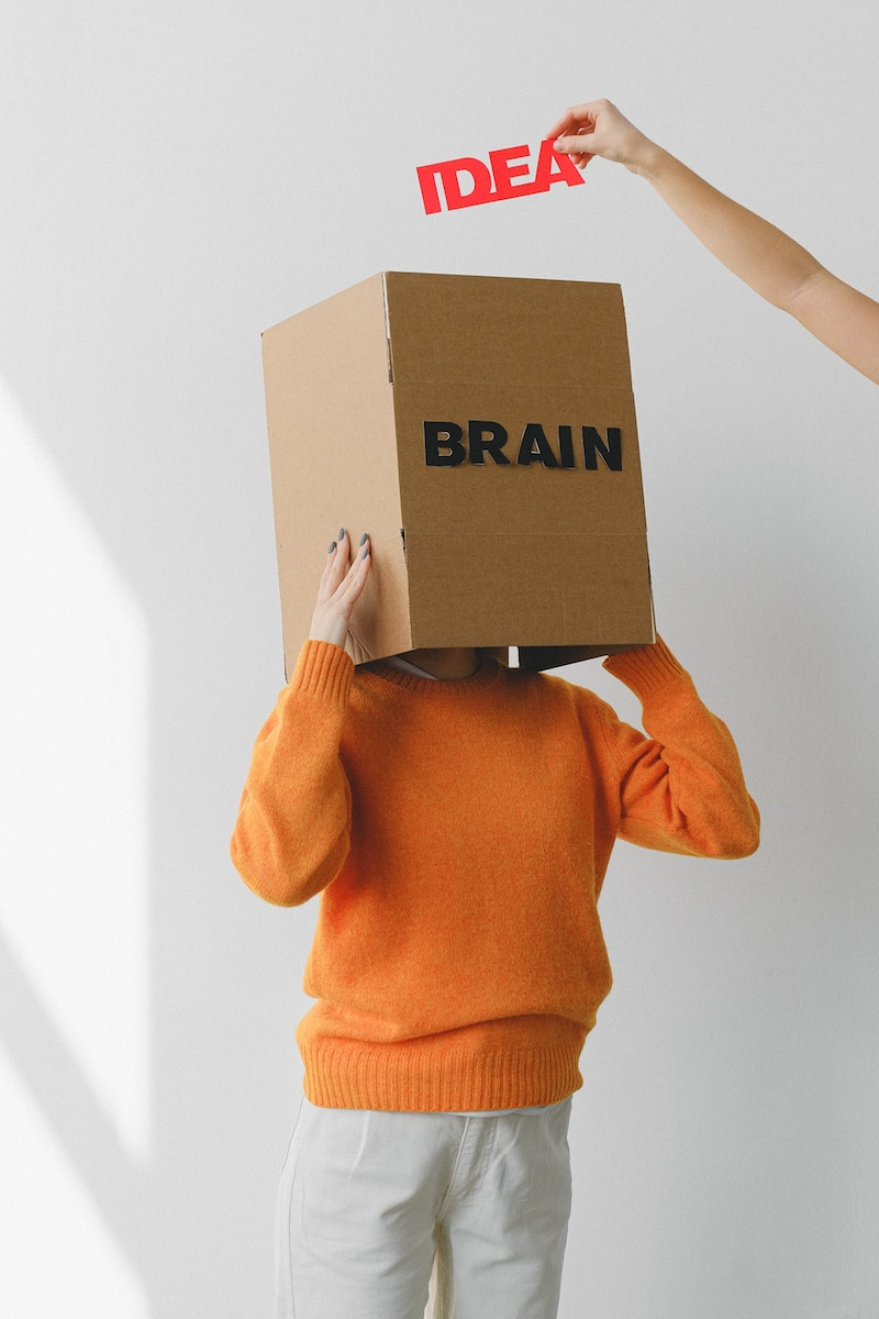 person with box on head