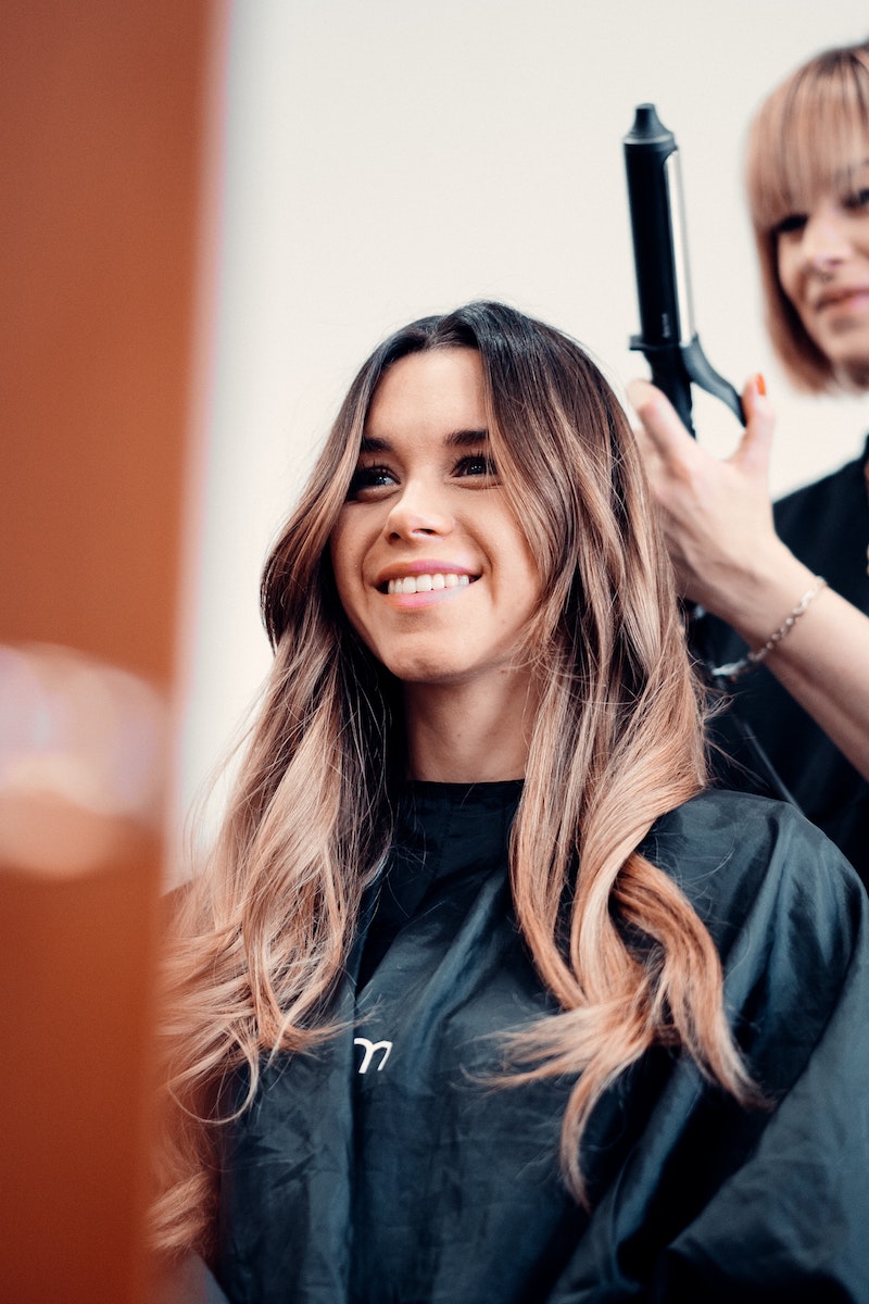woman getting her hair done