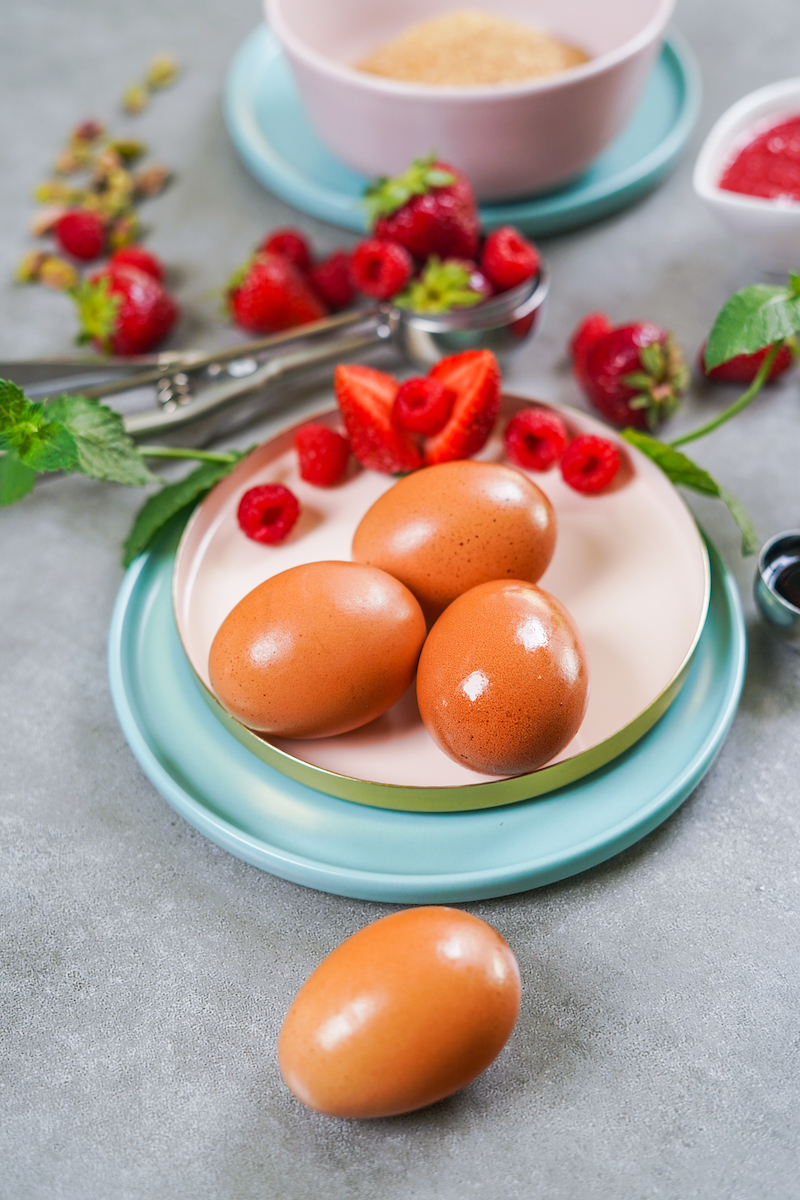 cloese up picture of eggs and berries