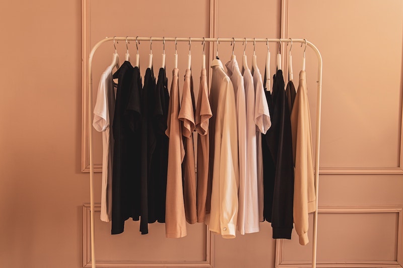 clothing rack on beige background
