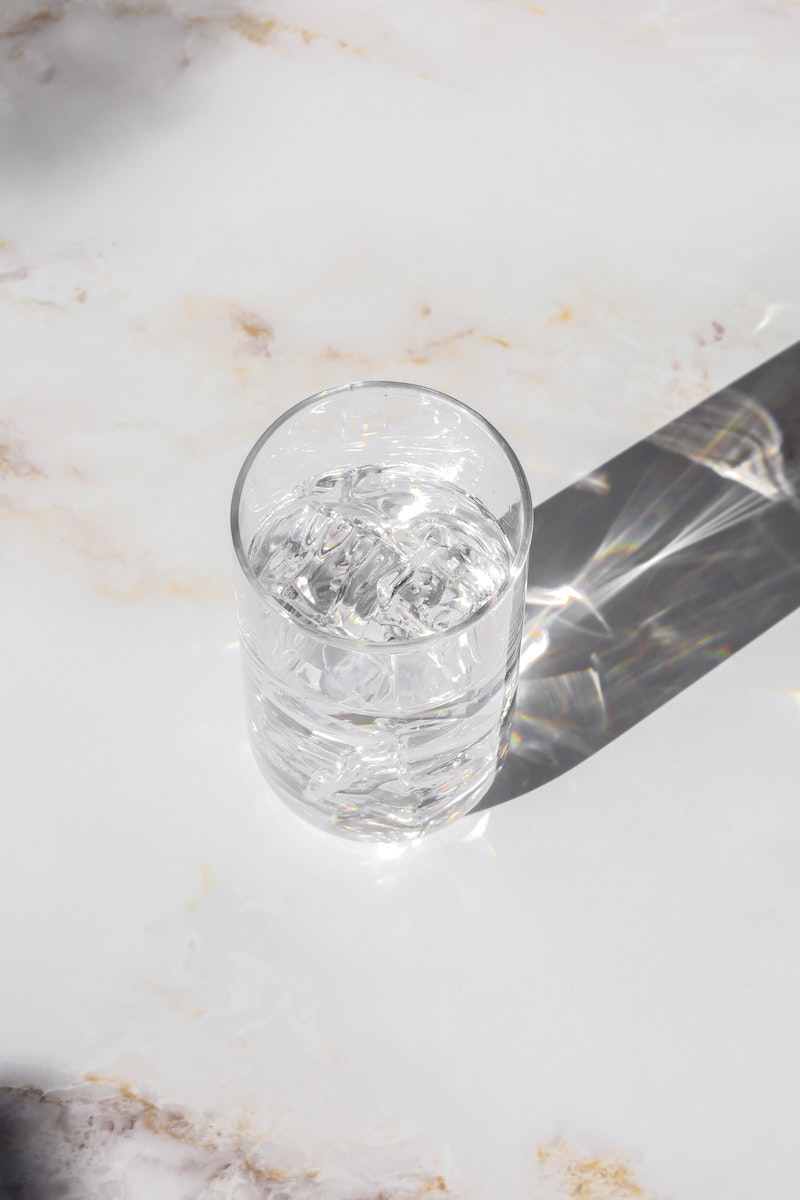 glass of water on marble counter